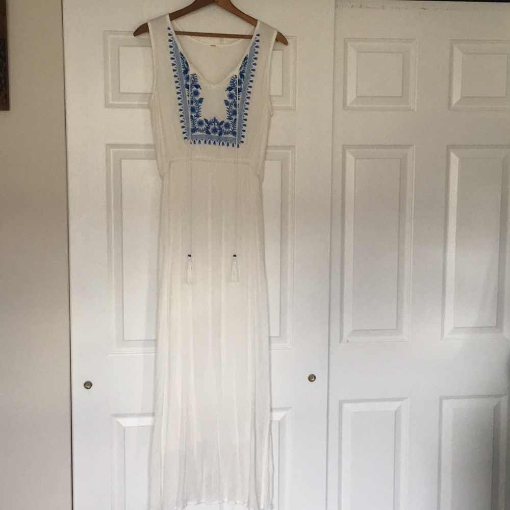 White maxi dress with blue embroidery